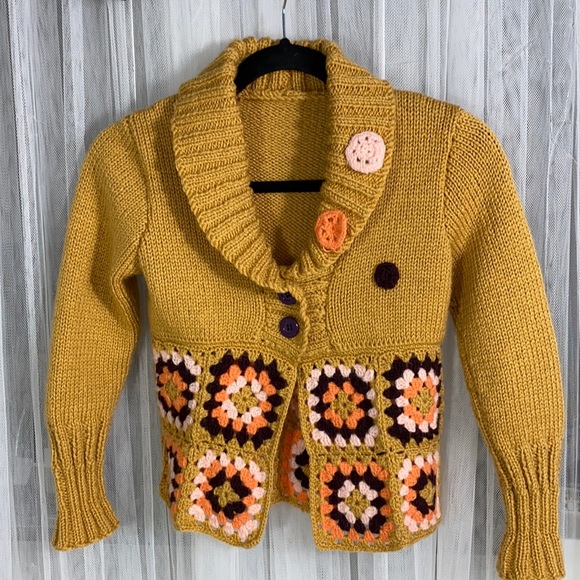 Hand knit kid’s sweater